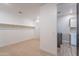 Large walk-in closet leads to a utility room with washer and dryer hookups and a sink at 11656 W Luxton Ln, Avondale, AZ 85323