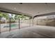 Covered patio view of pool with security fence and brick privacy wall at 12228 S Pewaukee St, Phoenix, AZ 85044