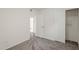 Bedroom features a closet with storage and a doorway to another room at 12228 S Pewaukee St, Phoenix, AZ 85044