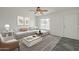 Bright living room featuring stylish furniture, neutral colors, and lots of natural light at 12228 S Pewaukee St, Phoenix, AZ 85044