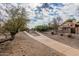 Wide community driveway leading to property at 12686 N 95Th Way, Scottsdale, AZ 85260