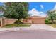 Charming single-story home with a well-manicured lawn, mature trees, and a two-car garage in a desirable neighborhood at 12686 N 95Th Way, Scottsdale, AZ 85260
