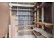 Unfinished basement with open shelving provides ample storage options at 131 N Higley Rd # 51, Mesa, AZ 85205