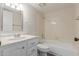 Standard bathroom featuring a sink, toilet, bathtub with shower combination and neutral decor at 131 N Higley Rd # 51, Mesa, AZ 85205
