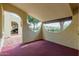 Red painted covered patio showcasing archway architectural detail at 131 N Higley Rd # 51, Mesa, AZ 85205