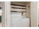 Convenient laundry closet featuring a white washer and dryer set at 131 N Higley Rd # 51, Mesa, AZ 85205