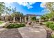 View of the community amenity with manicured landscaping and pergola covered area at 14250 W Wigwam Blvd # 722, Litchfield Park, AZ 85340