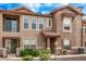Lovely townhome with a covered entry, balcony, and lush landscaping at 14250 W Wigwam Blvd # 722, Litchfield Park, AZ 85340