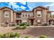 Inviting townhome exterior with manicured landscaping and a private entrance at 14250 W Wigwam Blvd # 722, Litchfield Park, AZ 85340