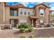 A welcoming townhome with a private balcony and nicely landscaped exterior at 14250 W Wigwam Blvd # 722, Litchfield Park, AZ 85340