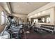 Well-equipped fitness center with modern exercise machines, weights, and mirrored walls at 14250 W Wigwam Blvd # 722, Litchfield Park, AZ 85340