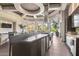 Community kitchen featuring sleek countertops, stainless steel appliances, and stylish bar seating at 14250 W Wigwam Blvd # 722, Litchfield Park, AZ 85340