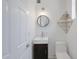 Modern bathroom featuring a vessel sink, sleek vanity, and contemporary fixtures at 1444 E Myrna Ln, Tempe, AZ 85284