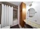 Bright bathroom featuring granite vanity, storage, and shower over tub at 1444 E Myrna Ln, Tempe, AZ 85284
