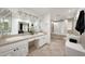 Bright bathroom with double vanity, ample counter space, and separate bathtub and shower at 1444 E Myrna Ln, Tempe, AZ 85284