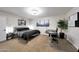 Comfortable bedroom features a cozy bed, stylish decor, and a functional workspace at 1444 E Myrna Ln, Tempe, AZ 85284