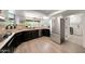 Modern kitchen showcases stainless steel appliances, contrasting cabinetry, and a bright, functional layout at 1444 E Myrna Ln, Tempe, AZ 85284