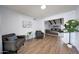 Cozy living room featuring hard wood floors, neutral paint and comfortable furniture at 1444 E Myrna Ln, Tempe, AZ 85284