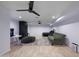 Spacious finished basement living area with large seating and entertainment options at 1444 E Myrna Ln, Tempe, AZ 85284