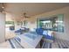 Comfortable outdoor living space with plush seating and a modern gas firepit at 1444 E Myrna Ln, Tempe, AZ 85284