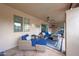 Comfortable outdoor living space with plush seating, ceiling fan, and patio at 1444 E Myrna Ln, Tempe, AZ 85284