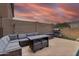 Outdoor living space featuring a patio with a comfortable seating area and a grill for entertaining at 14744 W Poinsettia Dr, Surprise, AZ 85379