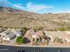 This property features breathtaking mountain views and boasts lush landscaping at 14841 S 6Th Pl, Phoenix, AZ 85048