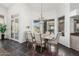 Dining room featuring a decorative chandelier and outdoor views at 14841 S 6Th Pl, Phoenix, AZ 85048