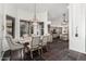 Open dining area with modern chandelier and easy kitchen access at 14841 S 6Th Pl, Phoenix, AZ 85048