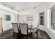 Elegant dining room with chandelier, table set for entertaining at 14841 S 6Th Pl, Phoenix, AZ 85048