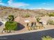 This single-story home is nestled among rolling hills with beautiful desert landscaping at 14841 S 6Th Pl, Phoenix, AZ 85048