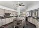 Bright kitchen with center island, granite countertops, and modern appliances at 14841 S 6Th Pl, Phoenix, AZ 85048