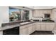 Bright kitchen with granite countertops and beautiful backyard view from sink at 14841 S 6Th Pl, Phoenix, AZ 85048