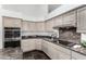 Well-appointed kitchen with ample cabinet space and modern appliances at 14841 S 6Th Pl, Phoenix, AZ 85048