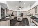 Open kitchen with a center island, plenty of storage, and stainless appliances at 14841 S 6Th Pl, Phoenix, AZ 85048