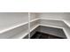 Walk-in pantry with organized shelving for ample storage space at 14841 S 6Th Pl, Phoenix, AZ 85048