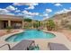 Lounge poolside, enjoying the sun and stunning desert views beyond the fenced yard at 14841 S 6Th Pl, Phoenix, AZ 85048
