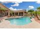Sparkling blue waters offer a refreshing escape in this backyard pool setting at 14841 S 6Th Pl, Phoenix, AZ 85048