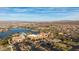 Aerial view of the community showcasing the lake and common areas at 16139 S 178Th Dr, Goodyear, AZ 85338