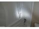 Bathroom featuring a full-size tub/shower combo with built-in shelves for toiletries at 16602 N 25Th St # 129, Phoenix, AZ 85032