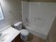 Standard bathroom with shower-tub combo, single vanity, and toilet at 16602 N 25Th St # 129, Phoenix, AZ 85032