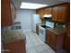 Well-lit kitchen featuring stainless steel appliances, ample counter space, and updated cabinets at 16602 N 25Th St # 129, Phoenix, AZ 85032