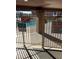 Community pool area entrance with a gated fence, posted rules, and mountain views at 16602 N 25Th St # 129, Phoenix, AZ 85032