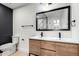 Bathroom showcasing a double sink vanity, modern fixtures, and design elements at 17040 N 39Th Ave, Glendale, AZ 85308