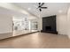 Spacious open-concept with wood flooring and fireplace at 17040 N 39Th Ave, Glendale, AZ 85308