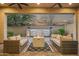 Backyard featuring a fire pit, seating area, and decorative wall water feature at 1915 N Bernard Cir, Mesa, AZ 85207