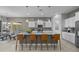 Modern kitchen boasting a large island with bar seating, stainless steel appliances, and ample cabinet space at 1915 N Bernard Cir, Mesa, AZ 85207
