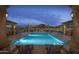 Stunning community pool with relaxing lounge chairs and breathtaking mountain views in a serene setting at 1915 N Bernard Cir, Mesa, AZ 85207