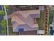 Top-down aerial view of the sprawling backyard featuring manicured lawns, pavers, and a covered patio at 20546 W Summit Pl, Buckeye, AZ 85396