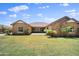 This home offers a spacious backyard, covered patio, and desert landscaping at 20546 W Summit Pl, Buckeye, AZ 85396